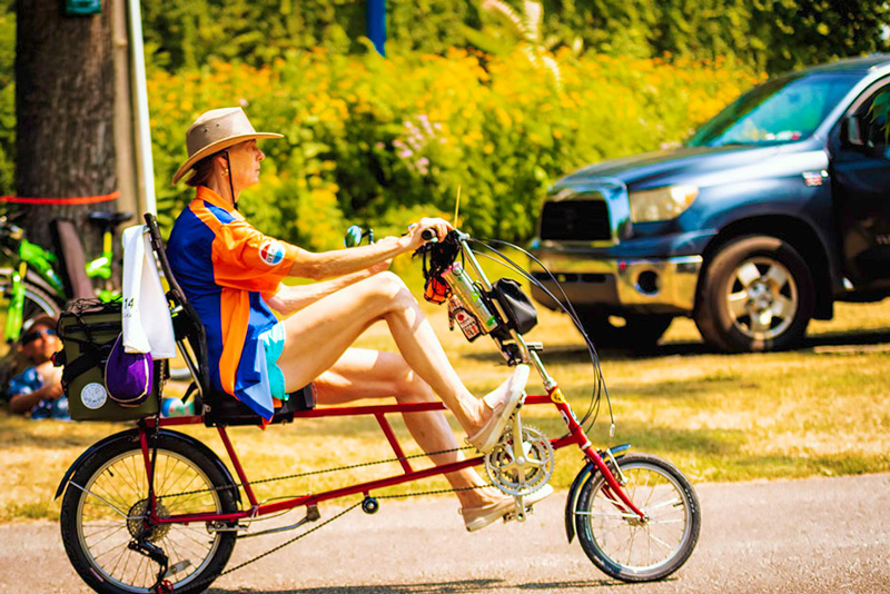 cyclist and parked car at Frontier Park